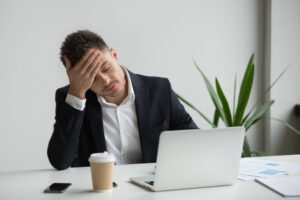 Frustrated Millennial Businessman Having Strong Headache Tired F