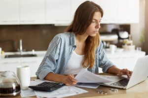 Young Woman Checking Her Budget Doing Taxes 273609 12843