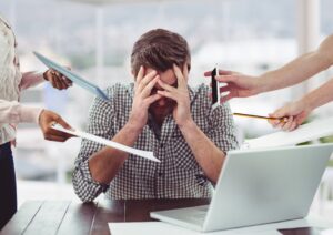 Stressed Man Frustrated With Electronic Devices