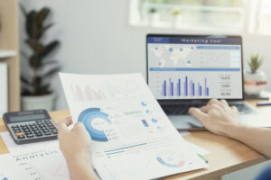 Businesspeople Working In Finance And Accounting Analyze Financi