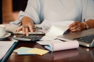 Entrepreneur Working With Bills 1098 20001