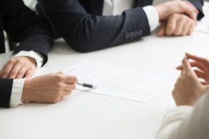Negotiations About Contract Terms Concept Hand Pointing Document Closeup 1163 4705